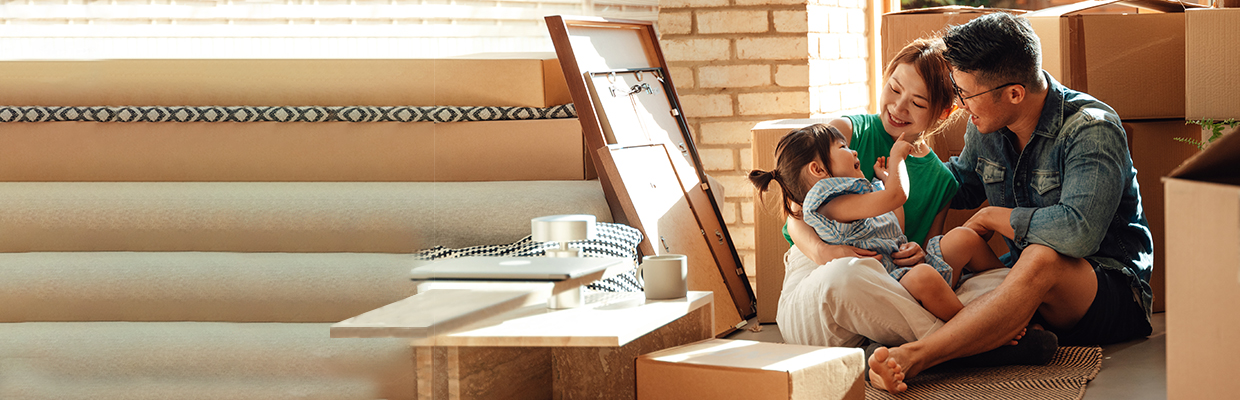 Son and parents painting a room; image used for HSBC Vietnam Home Equity Loan page