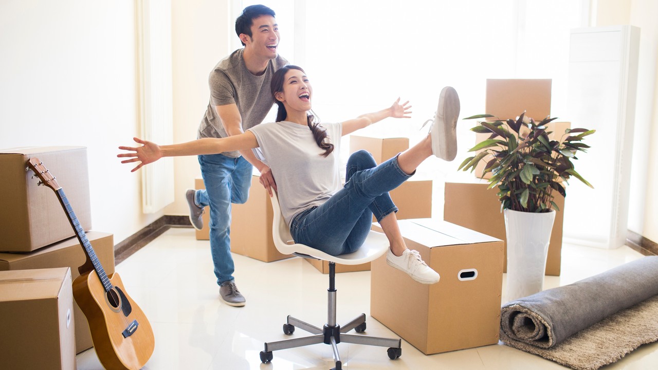 Excited couple in a new home; image used for HSBC VIetnam Loans page