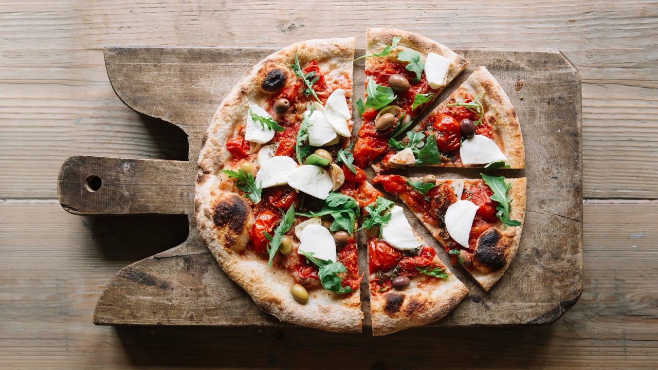 Half-cut pizza; image used for HSBC Vietnam debit card privilege club page